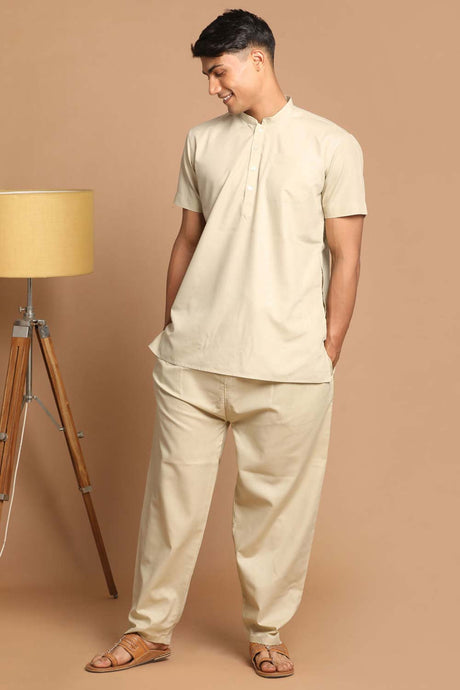 Buy Green Solid Kurta Pyjama Set Online