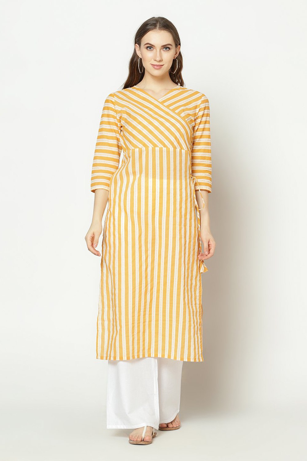 Buy Blended Cotton Stripes Kurti in Yellow